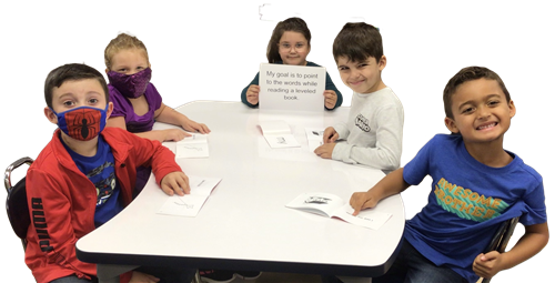 students working on a goal